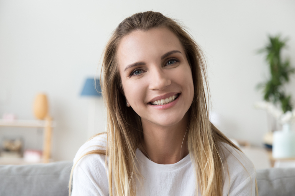 A smiling patient enjoying improved visual clarity and comfort after being fitted with advanced scleral lenses tailored to manage keratoconus and irregular corneas - Keratoconus/Scleral Lenses