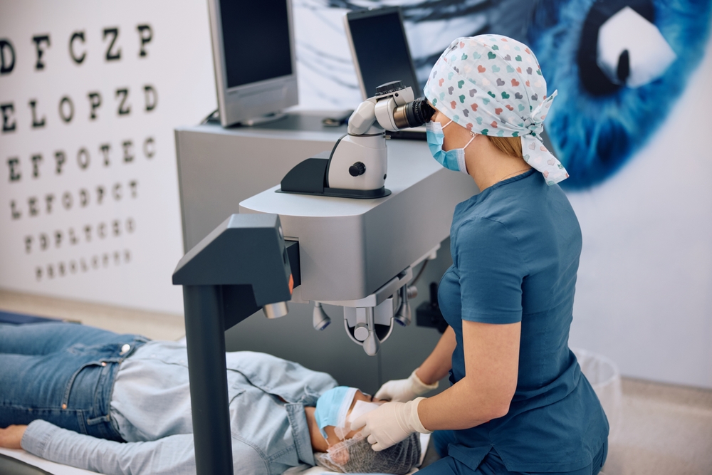 A skilled eye care professional operates advanced laser technology during a vision correction procedure, demonstrating precision equipment designed to enhance safety, accuracy, and patient outcomes - Our Technology